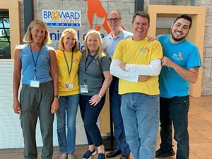 Left to Right: Lisa Hanron, volunteer, Susan Bates, volunteer, Lauralei Combs, Director, Commissioner Fisher, Mike Mullen’s, volunteer and Anthony Castaneda, Customer Service representative