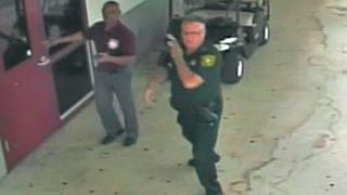 Former BSO Deputy Scot Peterson waits outside Marjory Stoneman Douglas High School
