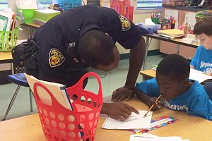 Officer James McDowell with Cops 4 Kids