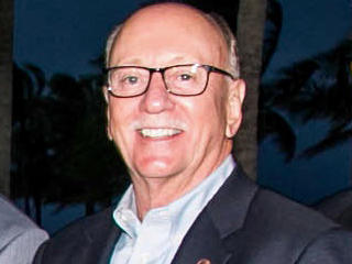 Commissioner Bruce G. Roberts