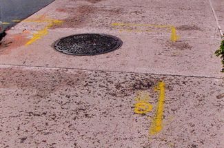 Utility Markings in front of Ocean Club Condominium