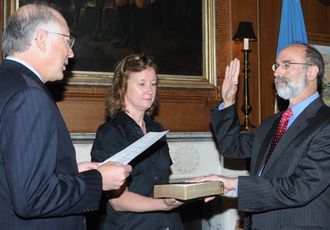 Interior Dept Director Ken Salazar swears in Michael R. Bromwich as BOEMRE’s new director